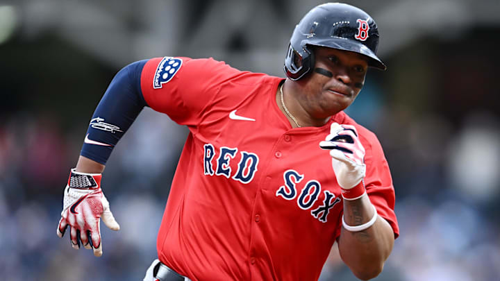 Boston Red Sox designated hitter Rafael Devers (11) rounds third base en route to scoring during the first inning against the Cleveland Guardians at Progressive Field.