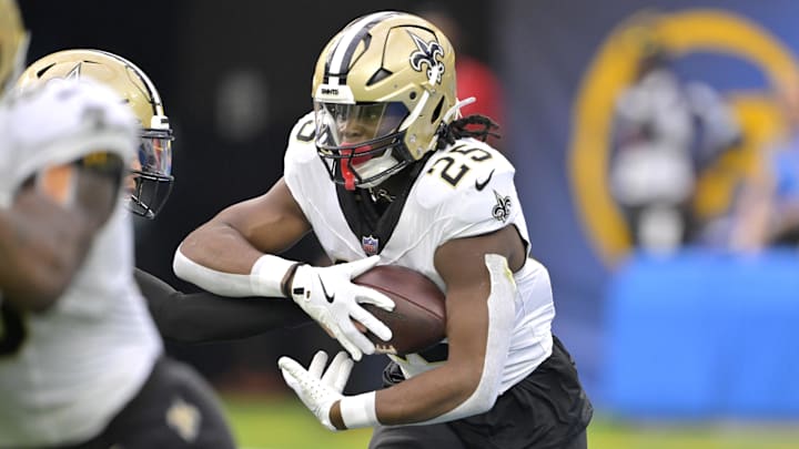 Oct 27, 2024; Inglewood, California, USA; New Orleans Saints running back Kendre Miller (25) carries the ball in the second half against the Los Angeles Chargers at SoFi Stadium. Mandatory Credit: Jayne Kamin-Oncea-Imagn Images