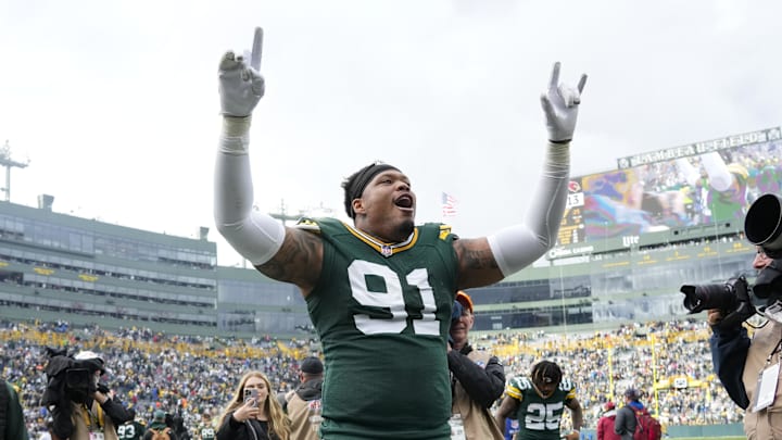 Green Bay Packers defensive lineman Preston Smith (91) celebrates following the game against the Arizona Cardinals at Lambeau Field.