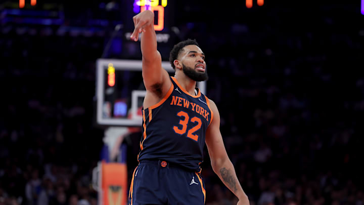 Dec 11, 2024; New York, New York, USA; New York Knicks center Karl-Anthony Towns (32) watches his three point shot against the Atlanta Hawks during the third quarter at Madison Square Garden. Dec 11, 2024; New York, New York, USA; New York Knicks center Karl-Anthony Towns (32) watches his three point shot against the Atlanta Hawks during the third quarter at Madison Square Garden.