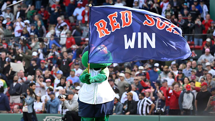 Sep 22, 2024; Boston, Massachusetts, USA; Wally the Boston Red Sox mascot celebrates the team's win over the Minnesota Twins at Fenway Park. Mandatory Credit: Eric Canha-Imagn Images Sep 22, 2024; Boston, Massachusetts, USA; Wally the Boston Red Sox mascot celebrates the team's win over the Minnesota Twins at Fenway Park. Mandatory Credit: Eric Canha-Imagn Images