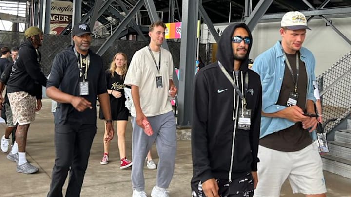 Many Orlando Magic players, plus coach Jamahl Mosley, attended Saturday's UCF-Colorado football game. 