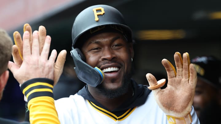 Apr 5, 2026; Pittsburgh, Pennsylvania, USA;  Pittsburgh Pirates center fielder Oneil Cruz (15) high-fives in the dugout after scoring a run against the Baltimore Orioles during the second inning at PNC Park. Mandatory Credit: Charles LeClaire-Imagn Images