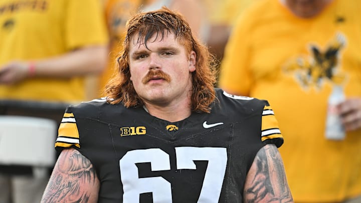 Sep 13, 2025; Iowa City, Iowa, USA; Iowa Hawkeyes offensive lineman Gennings Dunker (67) looks on before the game against the Massachusetts Minutemen at Kinnick Stadium. Mandatory Credit: Jeffrey Becker-Imagn Images