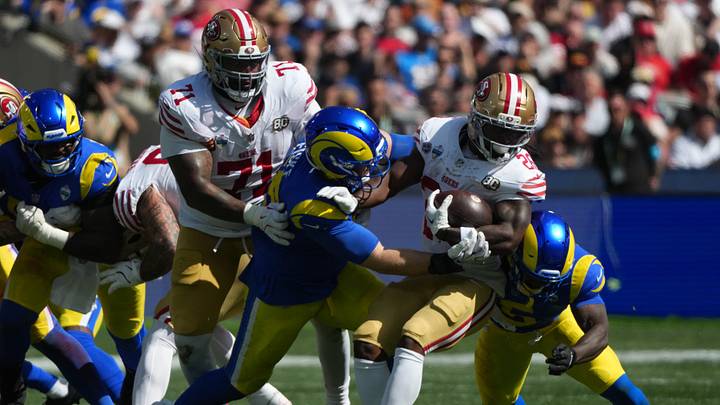Sep 11, 2026; Melbourne, AUS; San Francisco 49ers running back Kaelon Black (26) rushes the ball against the Los Angeles Rams in the second half at Melbourne Cricket Ground. Mandatory Credit: Kirby Lee-Imagn Images Sep 11, 2026; Melbourne, AUS; San Francisco 49ers running back Kaelon Black (26) rushes the ball against the Los Angeles Rams in the second half at Melbourne Cricket Ground. Mandatory Credit: Kirby Lee-Imagn Images