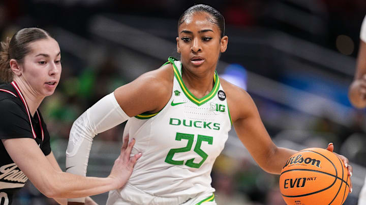 Oregon Ducks guard Deja Kelly (25) rushes up the court Thursday, March 6, 2025, during the Big Ten women's tournament at Gainbridge Fieldhouse in Indianapolis. Indiana Hoosiers defeated the Oregon Ducks, 78-62. Oregon Ducks guard Deja Kelly (25) rushes up the court Thursday, March 6, 2025, during the Big Ten women's tournament at Gainbridge Fieldhouse in Indianapolis. Indiana Hoosiers defeated the Oregon Ducks, 78-62.
