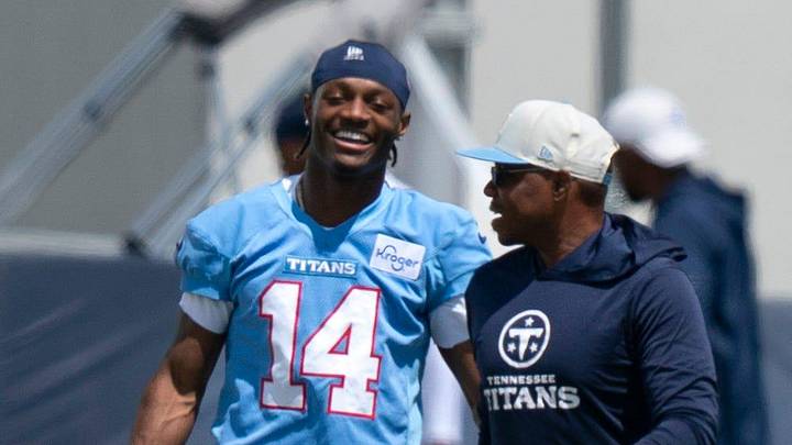 Tennessee Titans wide receiver Carnell Tate (14) talks with defensive pass game coordinator/cornerbacks coach Tony Oden during the Titans Rookie Camp Day 2 at Vanderbilt Health Football Center in Nashville, Tenn., Saturday, May 2, 2026. Tennessee Titans wide receiver Carnell Tate (14) talks with defensive pass game coordinator/cornerbacks coach Tony Oden during the Titans Rookie Camp Day 2 at Vanderbilt Health Football Center in Nashville, Tenn., Saturday, May 2, 2026.