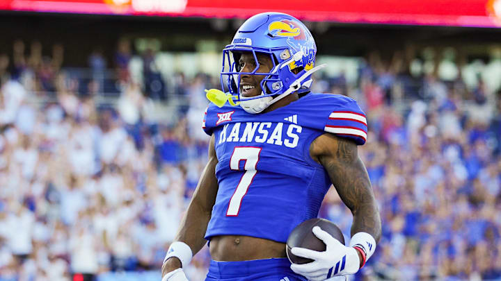 Aug 23, 2025; Lawrence, Kansas, USA; Kansas Jayhawks wide receiver Cam Pickett (7) scores a touchdown during the first half against the Fresno State Bulldogs at David Booth Kansas Memorial Stadium. Mandatory Credit: Jay Biggerstaff-Imagn Images Aug 23, 2025; Lawrence, Kansas, USA; Kansas Jayhawks wide receiver Cam Pickett (7) scores a touchdown during the first half against the Fresno State Bulldogs at David Booth Kansas Memorial Stadium. Mandatory Credit: Jay Biggerstaff-Imagn Images
