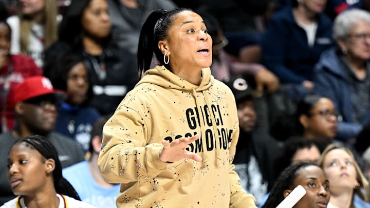 Dawn Staley coaches from the sideline against Utah in the Hall of Fame Classic. 