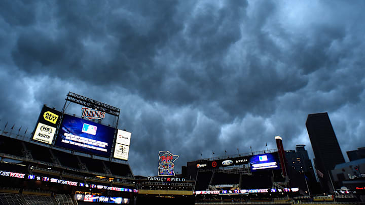 The Minnesota Twins and Atlanta Braves played on while tornado sirens blared all around Target Field.