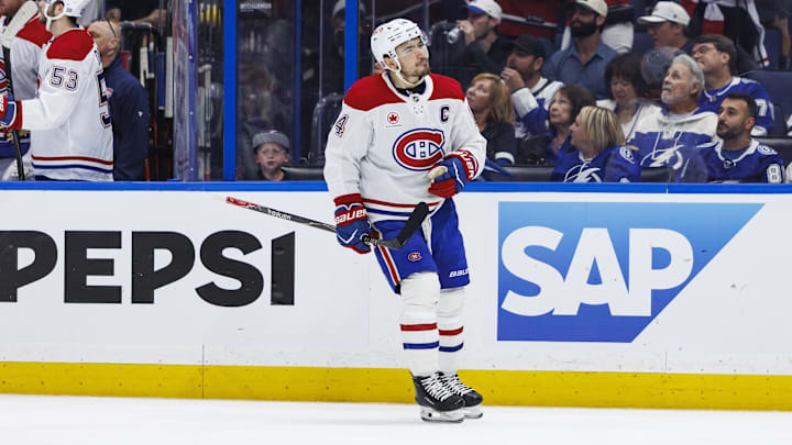 May 3, 2026; Tampa, Florida, USA; Montreal Canadiens forward Nick Suzuki (14) reacts after his opening goal against the Tampa Bay Lightning during the first period in game seven of the first round of the 2026 Stanley Cup Playoffs at Benchmark International Arena. Mandatory Credit: Morgan Tencza-Imagn Images