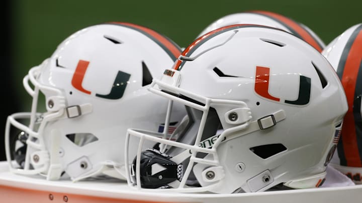 Miami Hurricanes helmets sit on the sidelines against the Pittsburgh Panthers during the third quarter at Heinz Field. Miami Hurricanes helmets sit on the sidelines against the Pittsburgh Panthers during the third quarter at Heinz Field.