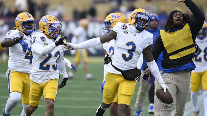 Dec 27, 2025; Annapolis, MD, USA;  East Carolina Pirates wide receiver Kelan Robinson (3) celebrates with teammates after scoring a touchdown on a fumble recovery during the second half of the Military Bowl against the East Carolina Pirates at Navy-Marine Corps Stadium. Mandatory Credit: Tommy Gilligan-Imagn Images
