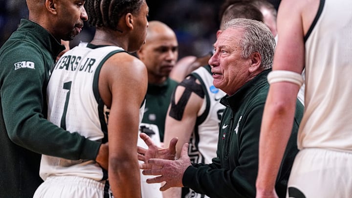 Michigan State head coach Tom Izzo talks to guard Jeremy Fears Jr. (1) at a timeout against Louisville during the second half of NCAA Tournament Second Round at KeyBank Center in Buffalo on Saturday, March 21, 2026.