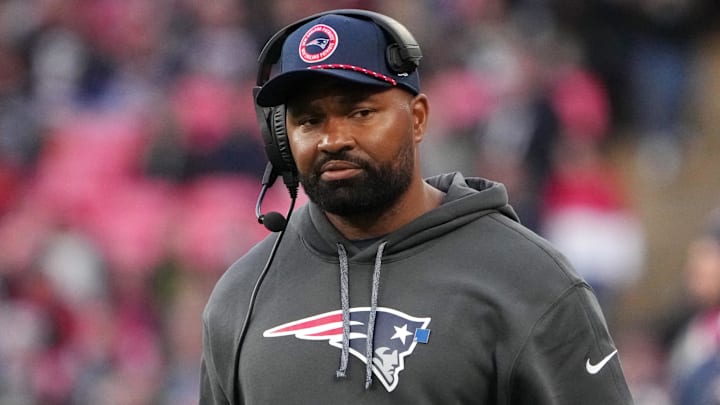 Oct 20, 2024; London, United Kingdom; New England Patriots coach Jerod Mayo watches from the sidelines against the New England Patriots in the second half of an NFL International Series game at Wembley Stadium. Mandatory Credit: Kirby Lee-Imagn Images