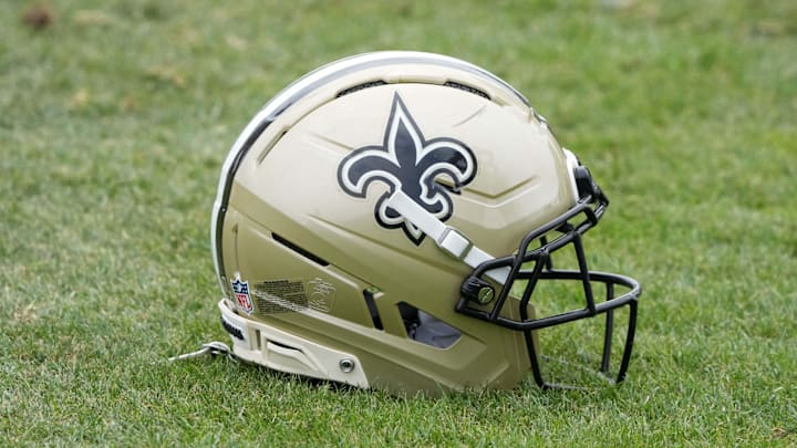 Aug 14, 2025; Carson, CA, USA; A New Orleans Saints helmet on the field during a joint practice against the Los Angeles Rams at the Dignity Health Sports Park. Mandatory Credit: Kirby Lee-Imagn Images