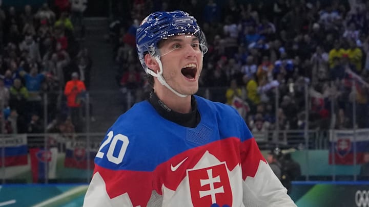 Feb 14, 2026; Milan, Italy; Juraj Slafkovsky of Slovakia reacts after the match during a Group B men's ice hockey game during the Milano Cortina 2026 Olympic Winter Games at Milano Santagiulia Ice Hockey Arena. Mandatory Credit: James Lang-Imagn Images