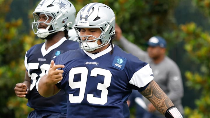 Dallas Cowboys defensive tackle Jay Toia goes through a drill during practice at the Ford Center at the Star Training Facility in Frisco, Texas.