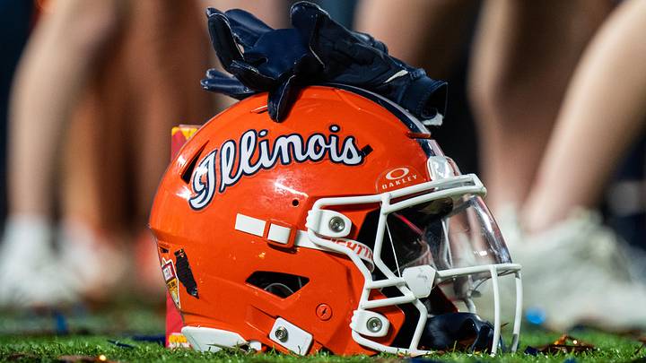 Dec 31, 2024; Orlando, FL, USA; A Illinois Fighting Illini helmet sitting on confetti after the game against the South Carolina Gamecocks at Camping World Stadium. Dec 31, 2024; Orlando, FL, USA; A Illinois Fighting Illini helmet sitting on confetti after the game against the South Carolina Gamecocks at Camping World Stadium.