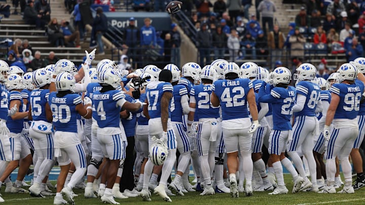 Nov 18, 2023; Provo, Utah, USA; The Brigham Young Cougars huddle up before the game against the Oklahoma Sooners at LaVell Edwards Stadium. Mandatory Credit: Rob Gray-USA TODAY Sports