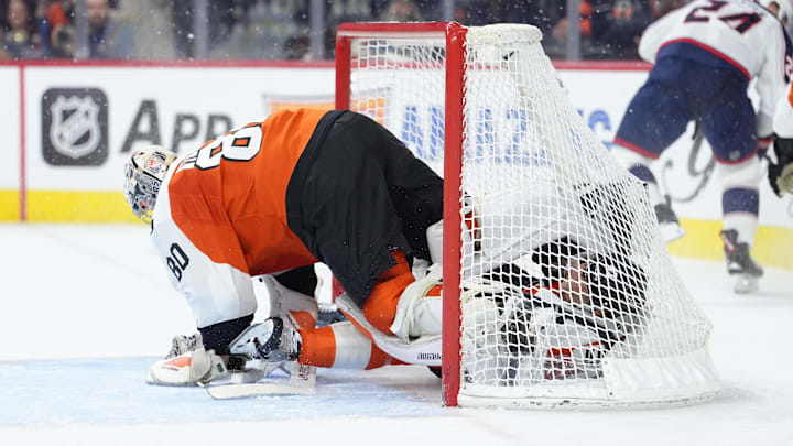 Mar 24, 2026; Philadelphia, Pennsylvania, USA; Philadelphia Flyers defenseman Noah Juulsen (47) collides with goalie Dan Vladar (80) against the Columbus Blue Jackets in the second period at Xfinity Mobile Arena.