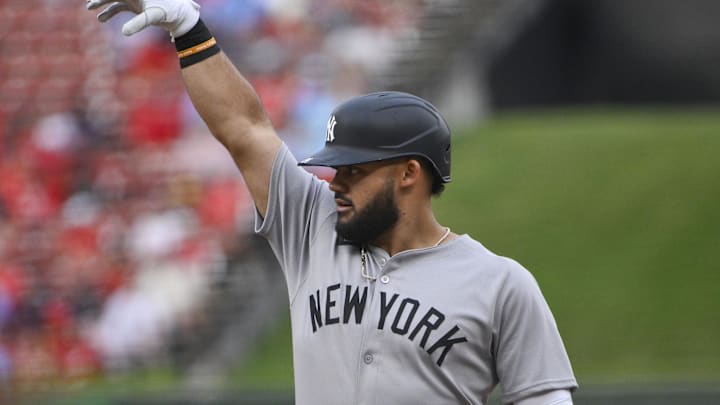 Aug 16, 2025; St. Louis, Missouri, USA;  New York Yankees left fielder Jasson Dominguez (24) reacts after hitting a one run single against the St. Louis Cardinals during the first inning at Busch Stadium. Mandatory Credit: Jeff Curry-Imagn Images