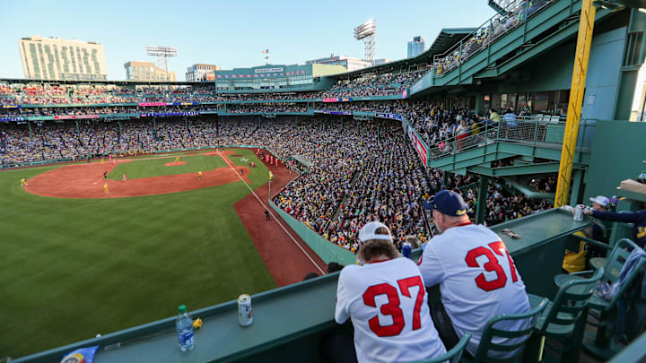Saturday, June 8, 2024; Boston MA-Fans watch the game from the top of the Green Monster during the Savannah Bananas first Banana Ball game at Fenway Park on Saturday, June 8, 2024. Saturday, June 8, 2024; Boston MA-Fans watch the game from the top of the Green Monster during the Savannah Bananas first Banana Ball game at Fenway Park on Saturday, June 8, 2024.