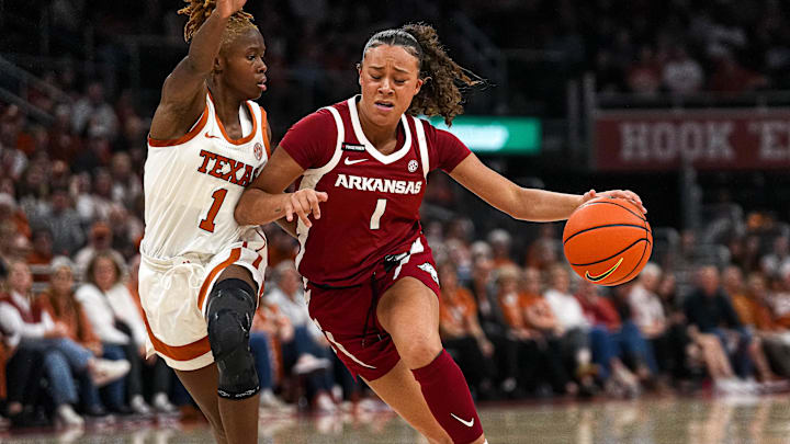 Arkansas guard Phoenix Stotijn (1) pushes past Texas Longhorns guard Bryanna Preston during a game at Moody Center. Mandatory Credit: Aaron E. Martinez/USA TODAY Network via Imagn Images Arkansas guard Phoenix Stotijn (1) pushes past Texas Longhorns guard Bryanna Preston during a game at Moody Center. Mandatory Credit: Aaron E. Martinez/USA TODAY Network via Imagn Images