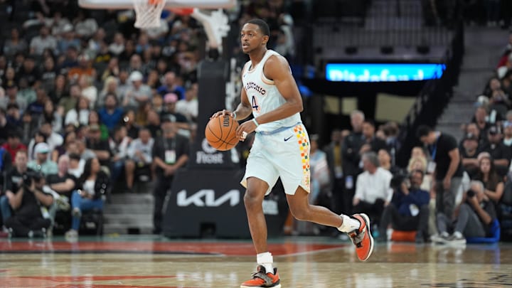 Mar 12, 2025; San Antonio, Texas, USA; San Antonio Spurs guard De'Aaron Fox (4) dribbles up the court in the first half against the Dallas Mavericks at Frost Bank Center. Mandatory Credit: Daniel Dunn-Imagn Images Mar 12, 2025; San Antonio, Texas, USA; San Antonio Spurs guard De'Aaron Fox (4) dribbles up the court in the first half against the Dallas Mavericks at Frost Bank Center. Mandatory Credit: Daniel Dunn-Imagn Images