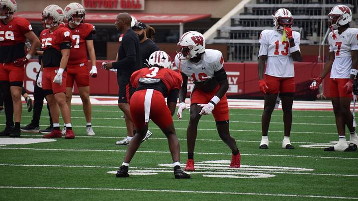 Wisconsin CB Cai Bates lines up against wideout Malachi Coleman. Wisconsin CB Cai Bates lines up against wideout Malachi Coleman.