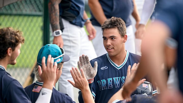 COTUIT 07/09/24 Daniel Cuvet celebrates with Brewster teammates after a solo homerun that put them up 3-1 against Cotuit Cape League baseball
Ron Schloerb/Cape Cod Times COTUIT 07/09/24 Daniel Cuvet celebrates with Brewster teammates after a solo homerun that put them up 3-1 against Cotuit Cape League baseball
Ron Schloerb/Cape Cod Times
