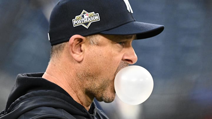 Oct 3, 2025; Toronto, Ontario, Canada;  New York Yankees manager Aaron Boone (17) watches his players during workouts at Rogers Centre. Mandatory Credit: Dan Hamilton-Imagn Images