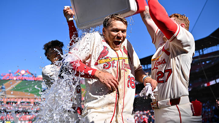Mar 28, 2026; St. Louis, Missouri, USA; St. Louis Cardinals shortstop JJ Wetherholt (26) is doused with water by shortstop Masyn Winn (0) and left fielder Nathan Church (27) after hitting a walk-off two run single against the Tampa Bay Rays during the tenth inning at Busch Stadium. Mandatory Credit: Jeff Curry-Imagn Images
