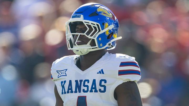 Nov 8, 2025; Tucson, Arizona, USA; Kansas Jayhawks linebacker Trey Lathan (4) against the Arizona Wildcats at Arizona Stadium. Mandatory Credit: Mark J. Rebilas-Imagn Images