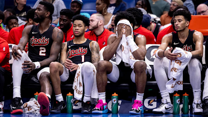 Mar 16, 2024; New Orleans, Louisiana, USA; Portland Trail Blazers guard Anfernee Simons (1) and center Deandre Ayton (2) on the bench in the final few minutes of the game against the New Orleans Pelicans during the second half at Smoothie King Center. Mandatory Credit: Stephen Lew-USA TODAY Sports Mar 16, 2024; New Orleans, Louisiana, USA; Portland Trail Blazers guard Anfernee Simons (1) and center Deandre Ayton (2) on the bench in the final few minutes of the game against the New Orleans Pelicans during the second half at Smoothie King Center. Mandatory Credit: Stephen Lew-USA TODAY Sports