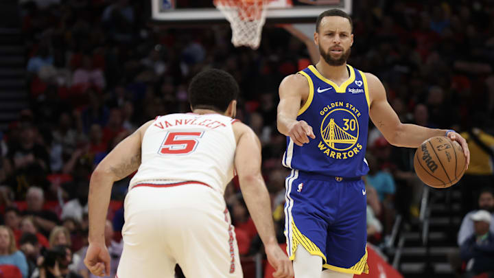 Apr 4, 2024; Houston, Texas, USA; Golden State Warriors guard Stephen Curry (30) dribbles against Houston Rockets guard Fred VanVleet (5) in the second quarter at Toyota Center. Mandatory Credit: Thomas Shea-Imagn Images