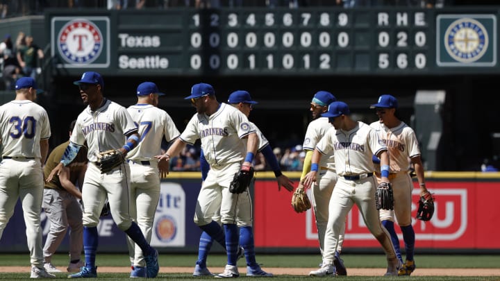Jun 16, 2024; Seattle, Washington, USA; Seattle Mariners players celebrate a 5-0 victory against the Texas Rangers at T-Mobile Park. Mandatory Credit: Joe Nicholson-USA TODAY Sports Jun 16, 2024; Seattle, Washington, USA; Seattle Mariners players celebrate a 5-0 victory against the Texas Rangers at T-Mobile Park. Mandatory Credit: Joe Nicholson-USA TODAY Sports