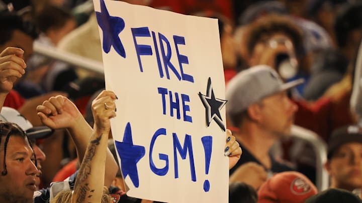 A Dallas Cowboys fan holds a sign reading “fire the GM” during the second quarter against the San Francisco 49ers at Levi's Stadium A Dallas Cowboys fan holds a sign reading “fire the GM” during the second quarter against the San Francisco 49ers at Levi's Stadium