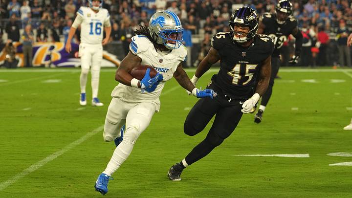 Sep 22, 2025; Baltimore, Maryland, USA; Detroit Lions running back Jahmyr Gibbs (0) rushes the ball past Baltimore Ravens linebacker Mike Green (45) during the first half at M&T Bank Stadium. Mandatory Credit: Mitch Stringer-Imagn Images Sep 22, 2025; Baltimore, Maryland, USA; Detroit Lions running back Jahmyr Gibbs (0) rushes the ball past Baltimore Ravens linebacker Mike Green (45) during the first half at M&T Bank Stadium. Mandatory Credit: Mitch Stringer-Imagn Images