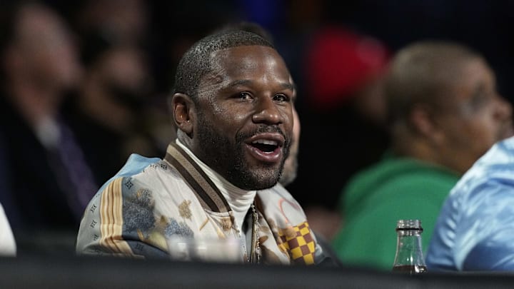 Dec 14, 2024; Las Vegas, Nevada, USA; Floyd Mayweather looks on during the first half between the Milwaukee Bucks and the Atlanta Hawks in a semifinal of the 2024 Emirates NBA Cup at T-Mobile Arena. Mandatory Credit: Kyle Terada-Imagn Images