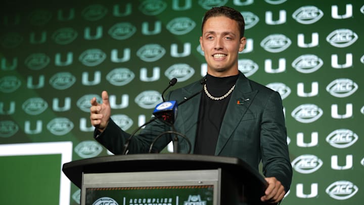 Jul 22, 2025; Charlotte, NC, USA; Miami quarterback Carson Beck answers questions from the media during ACC Media Days at Hilton Charlotte Uptown. Mandatory Credit: Jim Dedmon-Imagn Images