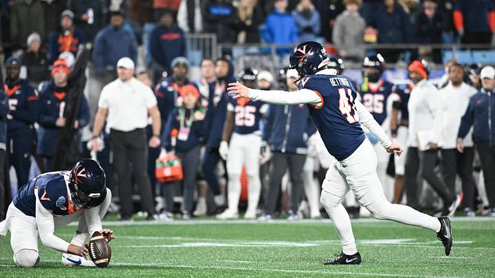 Dec 6, 2025; Charlotte, NC, USA; Virginia Cavaliers kicker Will Bettridge (41) kicks a field goal in the third quarter against the Duke Blue Devils during the 2025 ACC Championship game at Bank of America Stadium. Mandatory Credit: Bob Donnan-Imagn Images Dec 6, 2025; Charlotte, NC, USA; Virginia Cavaliers kicker Will Bettridge (41) kicks a field goal in the third quarter against the Duke Blue Devils during the 2025 ACC Championship game at Bank of America Stadium. Mandatory Credit: Bob Donnan-Imagn Images