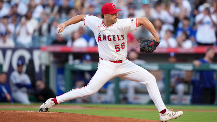 Aug 12, 2025; Anaheim, California, USA; Los Angeles Angels relief pitcher Victor Mederos (58) throws in the first inning against the Los Angeles Dodgers at Angel Stadium. Mandatory Credit: Kirby Lee-Imagn Images