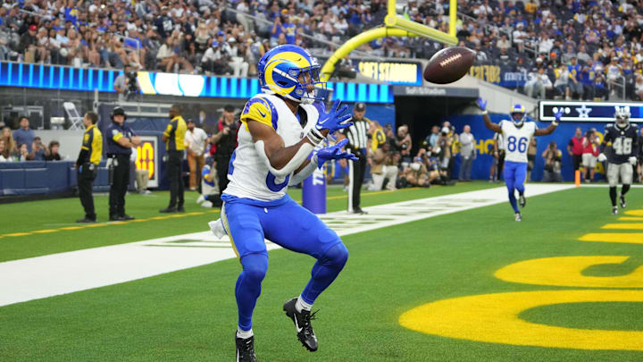 Aug 9, 2025; Inglewood, California, USA; Los Angeles Rams wide receiver Brennan Presley (81) catches a 7-yard touchdown pass in the fourth quarter against the Dallas Cowboys at SoFi Stadium. Mandatory Credit: Kirby Lee-Imagn Images
