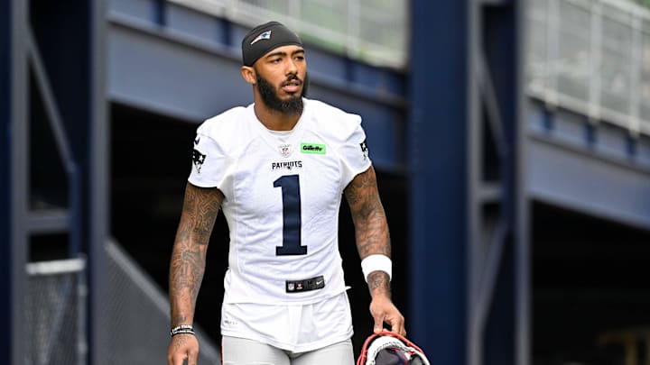 Jun 9, 2025; Foxborough, MA, USA; New England Patriots wide receiver Ja'Lynn Polk (1) walks to the practice fields at Gillette Stadium. Mandatory Credit: Eric Canha-Imagn Images