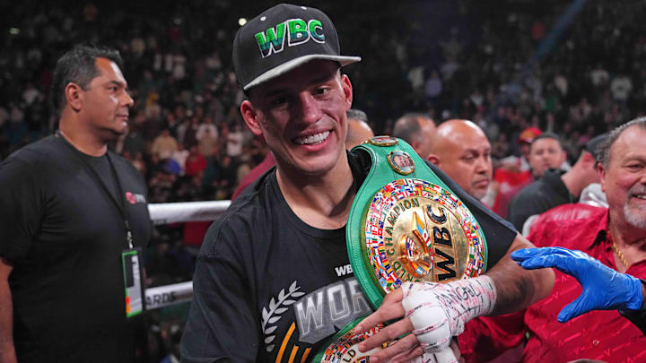 David Benavidez celebrates after defeating Caleb Plant (not pictured) in their Interim WBC Super Middleweight Championship boxing bout at MGM Grand Garden Arena.