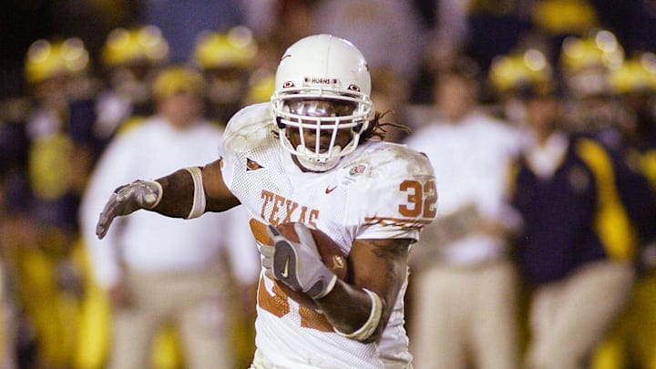 Jan 1, 2005; Pasadena, CA, USA: FILE PHOTO; Texas Longhorns running back Cedric Benson (32) in action against the Michigan Wolverines during the 2005 Rose Bowl at the Rose Bowl. The Longhorns defeated the Wolverines 38-37. Mandatory Credit: Richard Mackson-USA TODAY Network