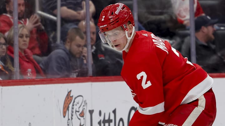 Detroit Red Wings defenseman Olli Maatta (2) skates with the puck behind the net.