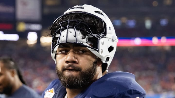 Dec 31, 2024; Glendale, AZ, USA; Penn State Nittany Lions offensive lineman Olaivavega Ioane (71) against the Boise State Broncos during the Fiesta Bowl at State Farm Stadium. Mandatory Credit: Mark J. Rebilas-Imagn Images