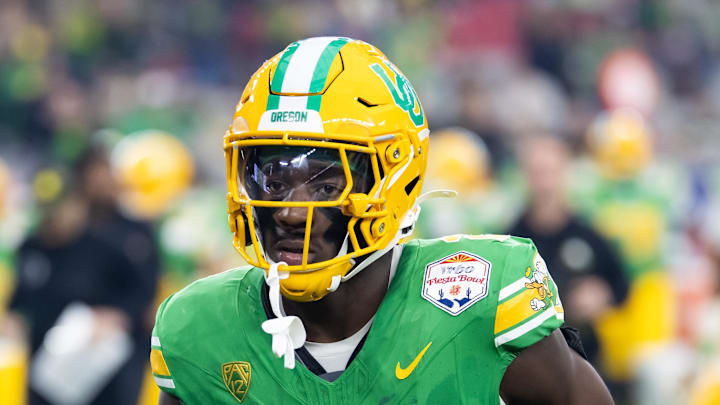 Jan 1, 2024; Glendale, AZ, USA; Oregon Ducks linebacker Jeffrey Bassa (2) against the Liberty Flames during the 2024 Fiesta Bowl at State Farm Stadium. Mandatory Credit: Mark J. Rebilas-Imagn Images